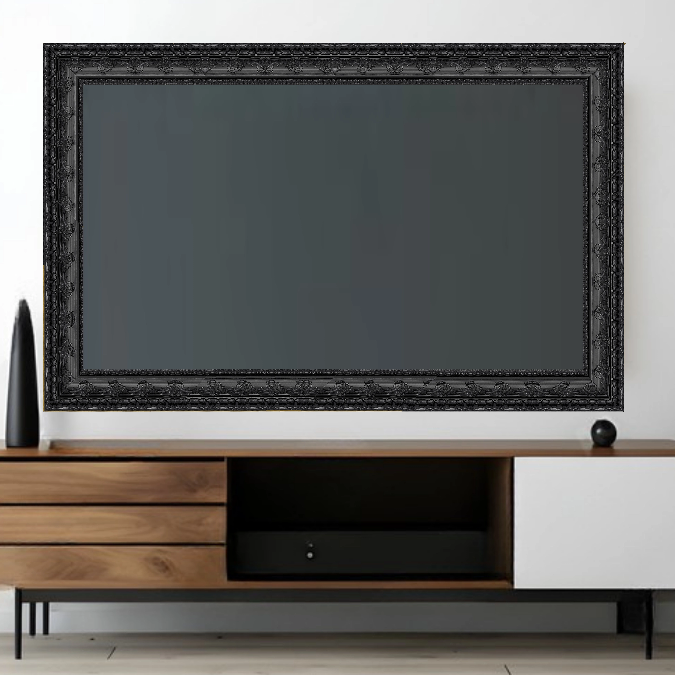 black-ornate-tv-frame-mounted-television-living-room Ornate black TV frame mounted around television in modern living room