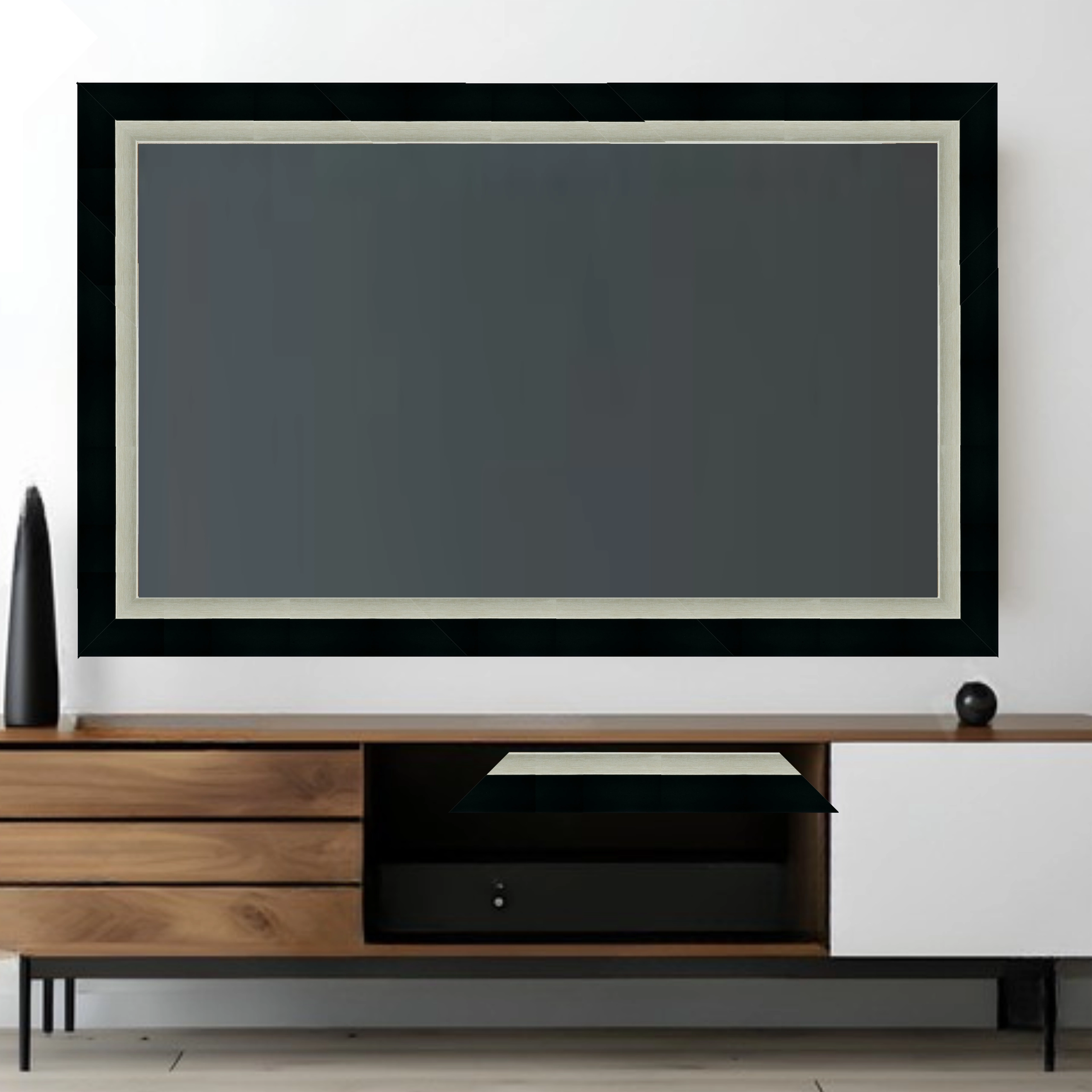 black-silver-modern-tv-frame-wall-mounted-television Black and silver modern TV frame surrounding a wall mounted television in a contemporary living room