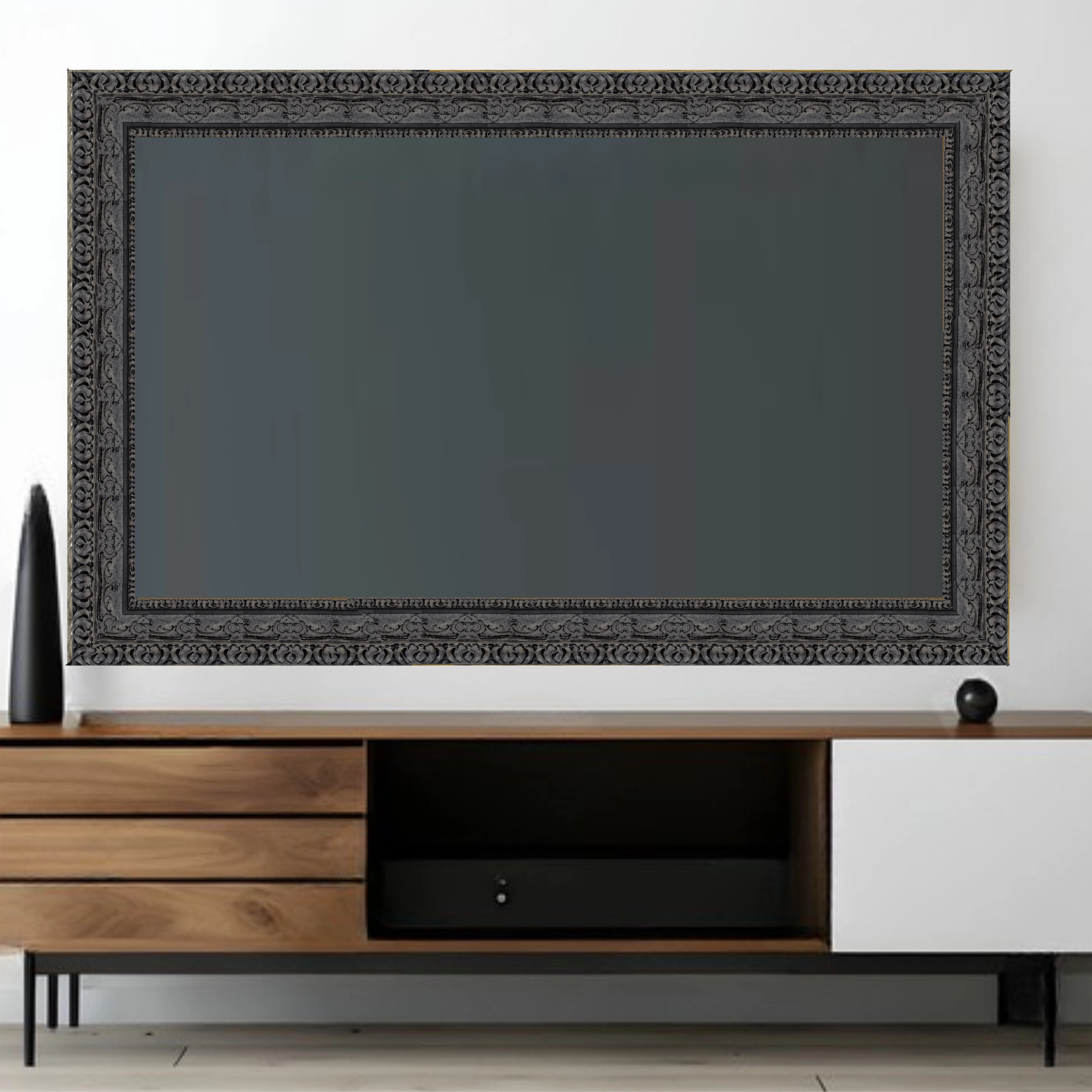dark-gothic-tv-frame-mounted-television-living-room Dark gothic style TV frame surrounding wall mounted television in modern living room