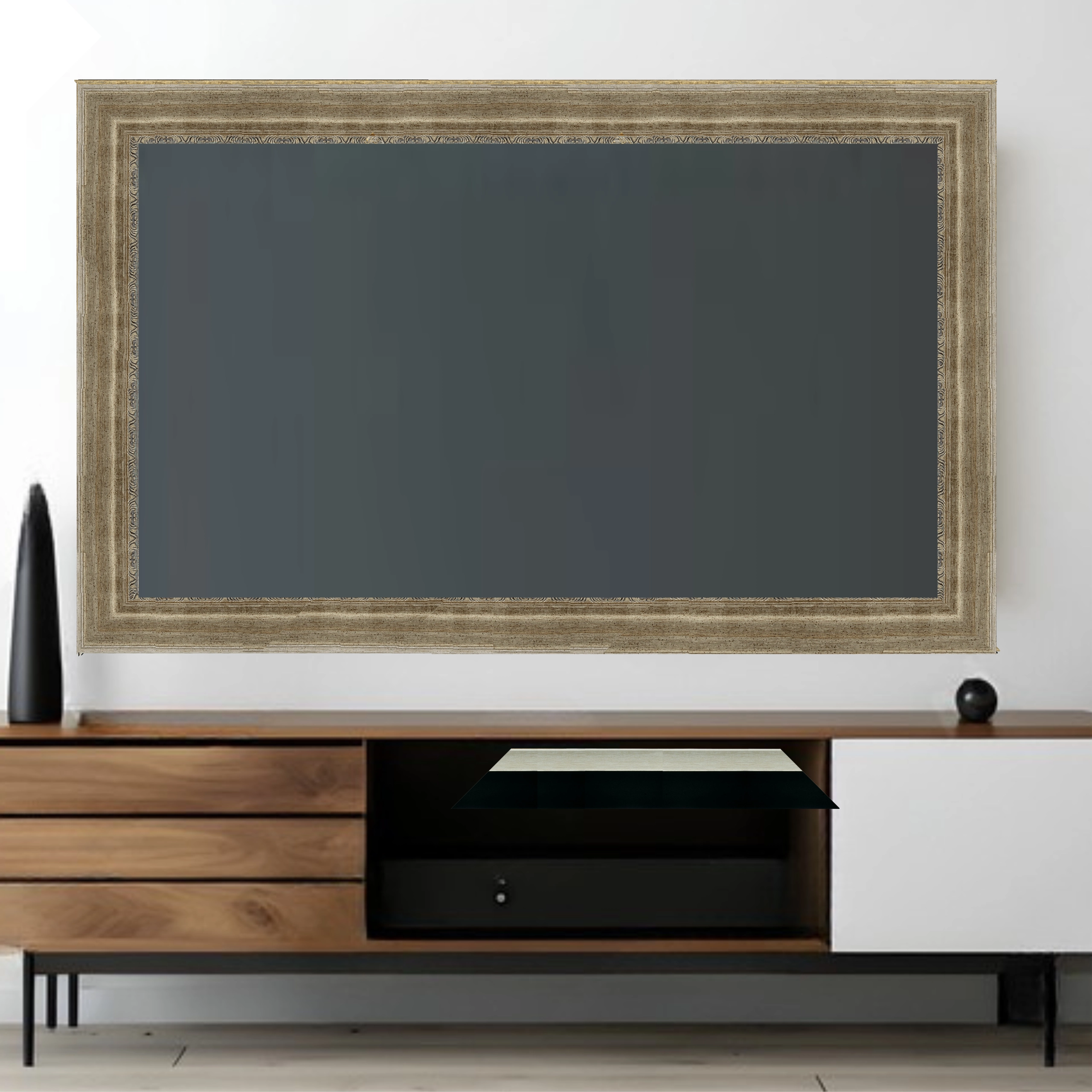 distressed-antique-silver-tv-frame-modern-living-room Distressed antique silver TV frame mounted around television in modern living room