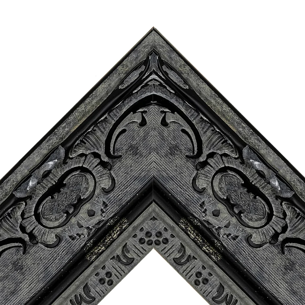 Ornate gothic style decorative TV frame corner with dark carved detailing by TV Framez