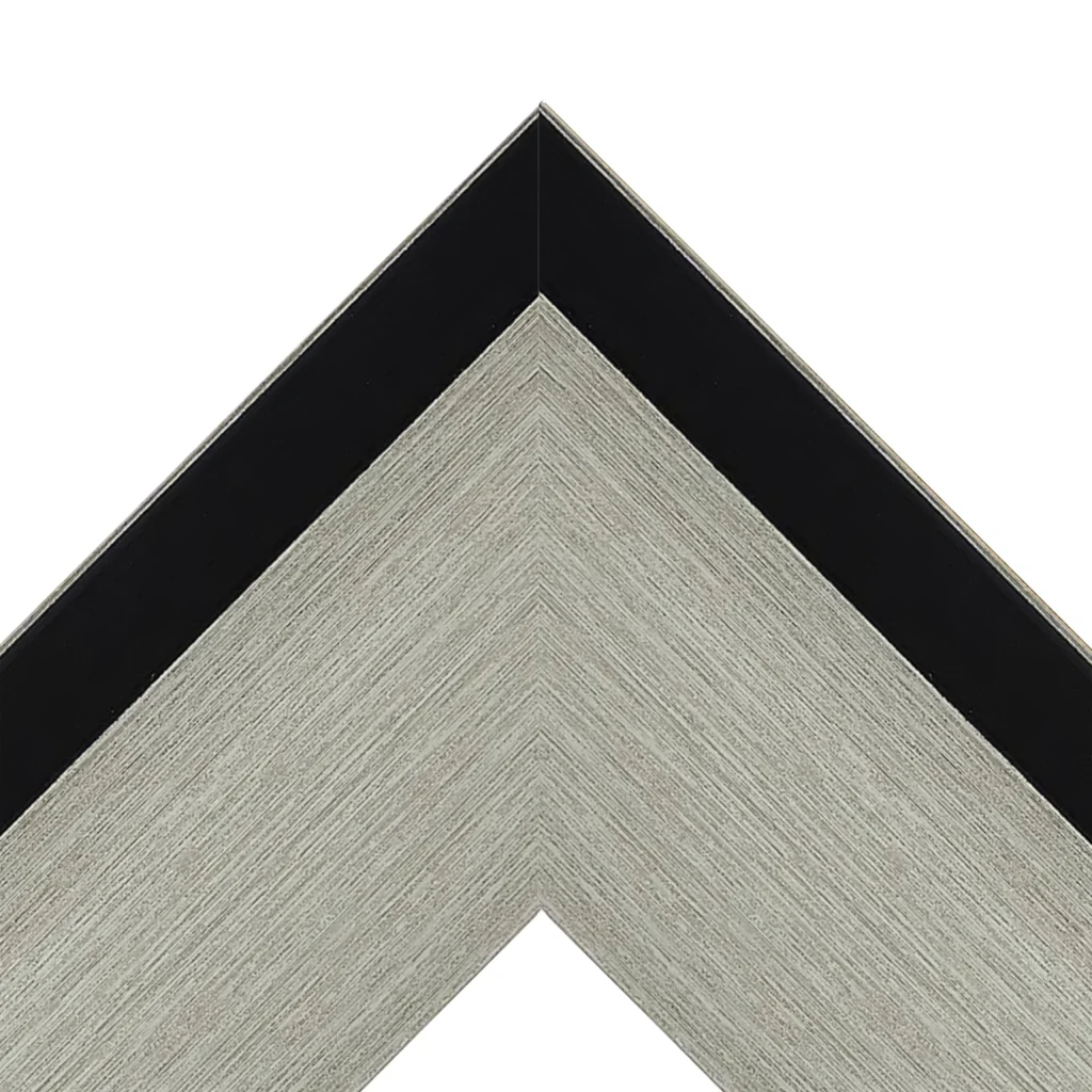 Silver textured TV frame corner with black outer edge detail