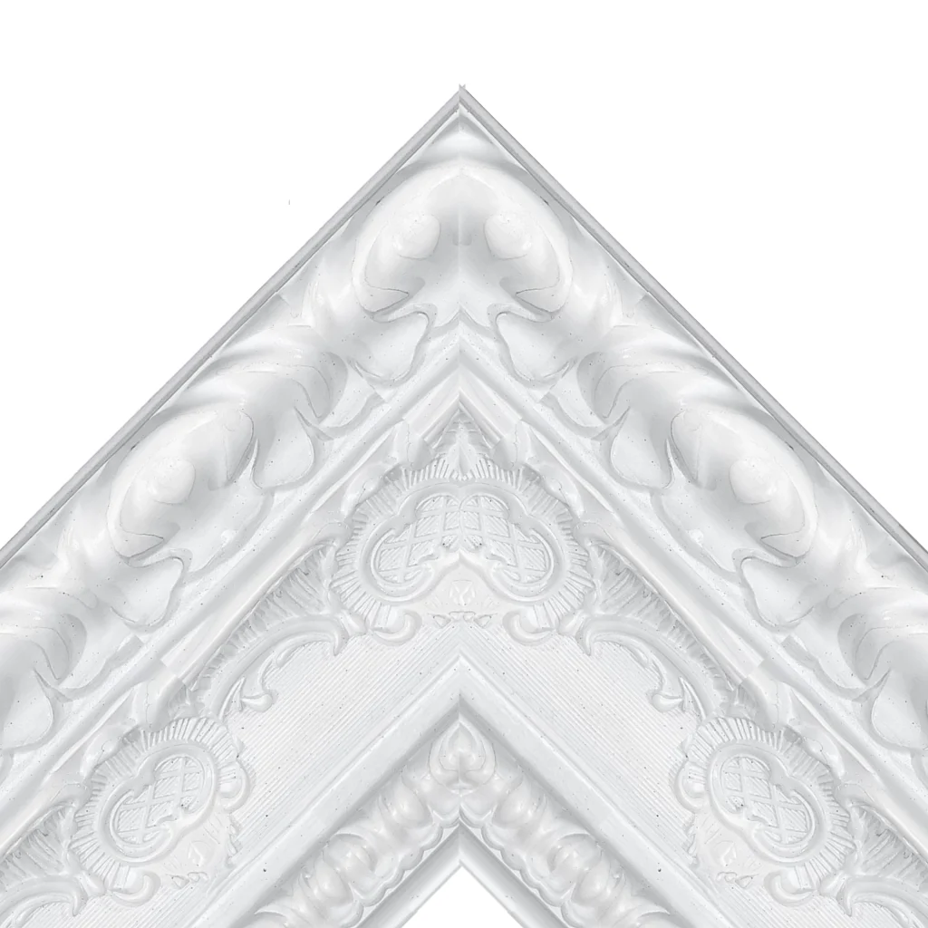 White ornate decorative TV frame corner with classic carved detailing